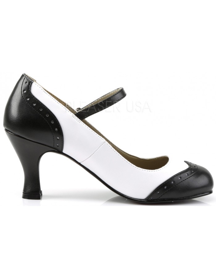 black and white spectator pumps